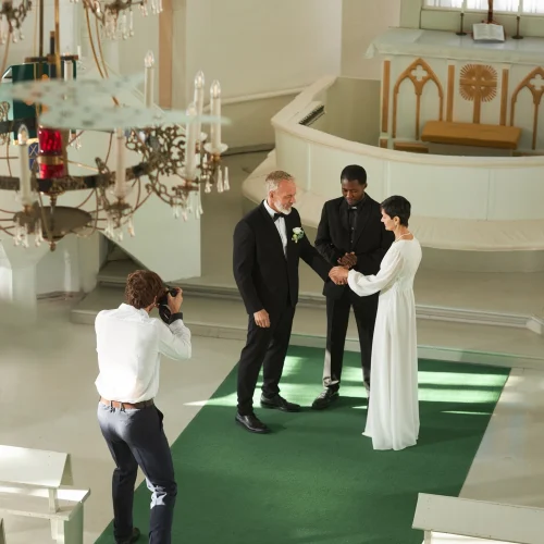 wedding-ceremony-in-church-with-photographer-takin-2025-03-05-12-52-55-utc
